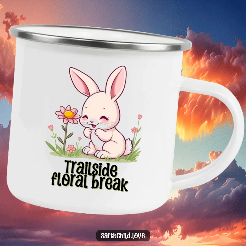Funny kawaii bunny camping mug, a cute bunny sniffing a wildflower with delight, ready for outdoor fun.