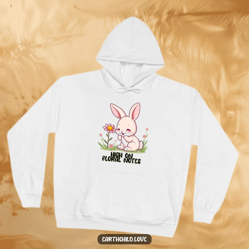 Funny kawaii bunny hoodie, depicting a cute bunny sniffing a beautiful wildflower with pure delight.