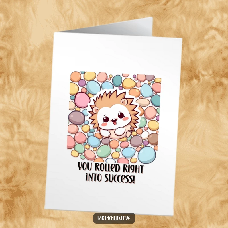 Funny Free Printable Congrats Card: A Kawaii hedgehog rolling playfully among colorful pebbles, celebrating achievements.