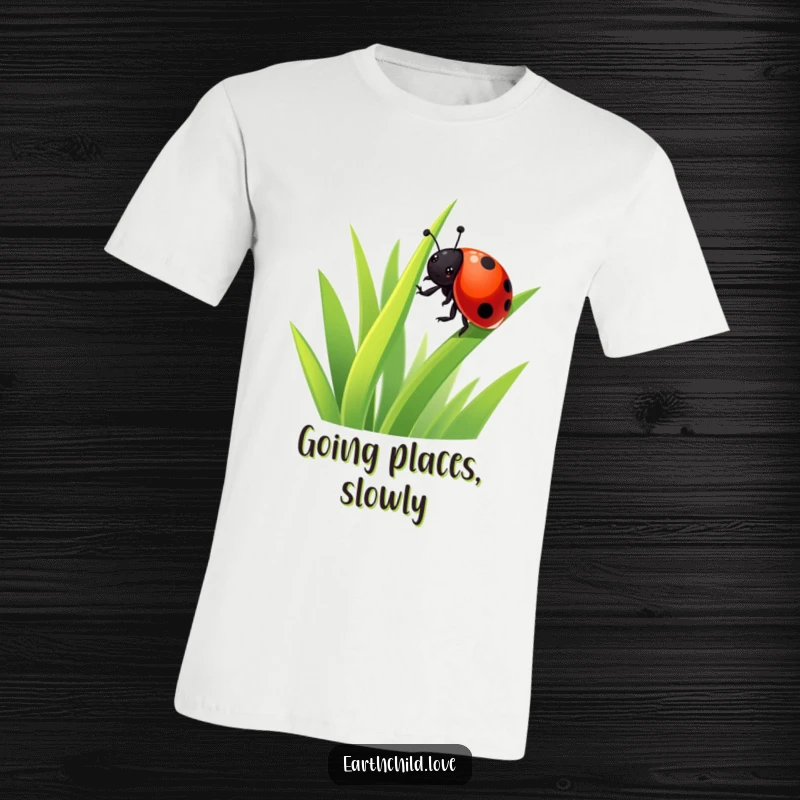 Funny Kawaii Ladybug T-Shirt showing a happy ladybug enthusiastically on a blade of grass, a super cute and funny tee for nature fans.